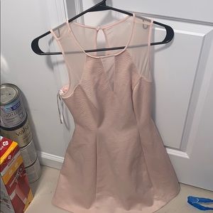 I am selling a light pink Guess dress.